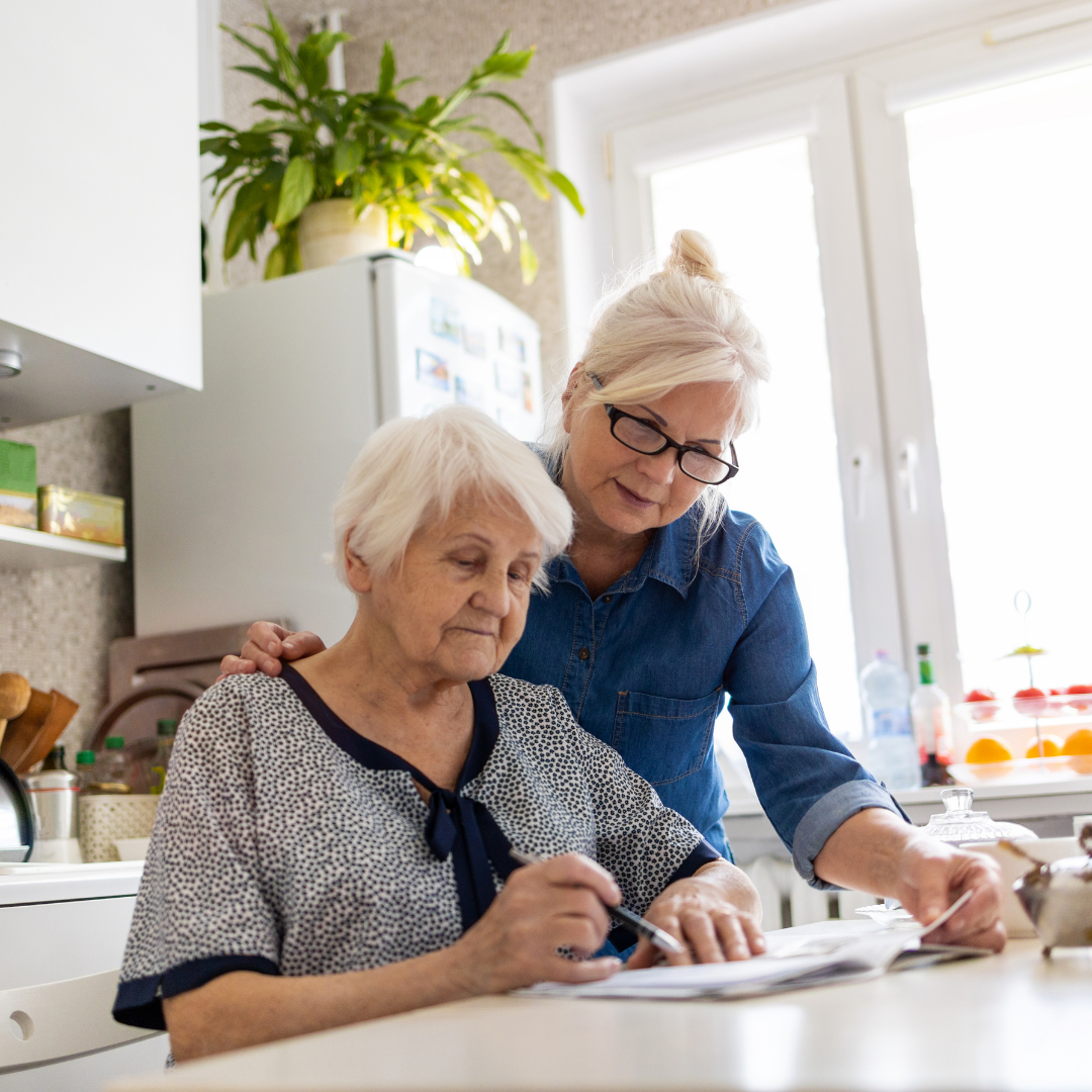 2 women with documents